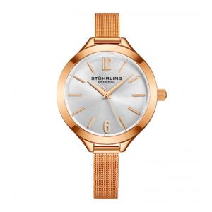 Relgio feminino Stuhrling com moldura e ponteiros em ouro rosa e mostrador prateado.
