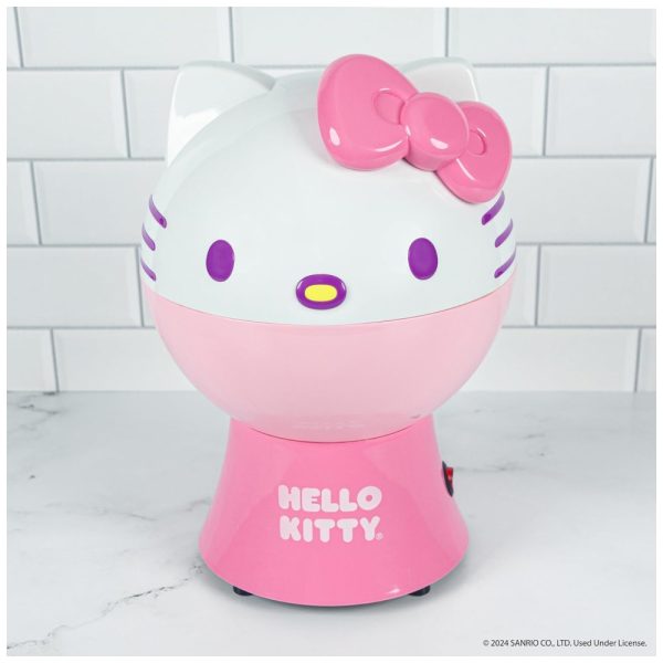 ectq1l9y7mgc0b_0 jpg - Pipoqueira Elétrica com Tema Hello Kitty, Copo Medidor e Tampa que Vira Tigela de Servir, 110V, Uncanny Brands, Rosa