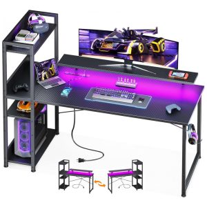 Mesa Gamer Reversível ODK 140 cm Fibra de Carbono Preto com Luzes LED Tomadas USB Prateleiras Ajustáveis e Suporte para Monitor